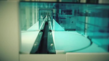 Automated laboratory for blood testing. Moving line with test tubes. PCR Test Covid 19, Antibody test