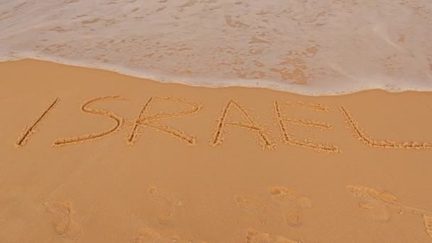 Strand Von Tel Aviv Israel Inschrift Sand Kerl Rennen Auf — Stockvideo