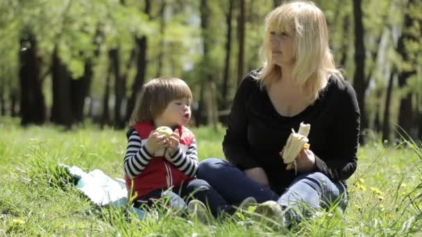 Little Boy Striped Shirt Sits Shoulders Blonde Mom Family Admires — Stock Video