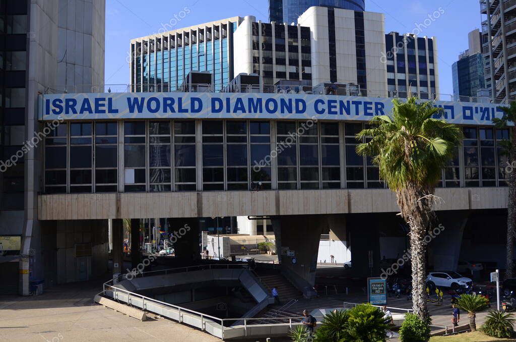 Ramat Gan, Israel - June 2022: Israel World Diamond Center sign and logo. Israel Diamond Exchange and skyscrapes. Street view.