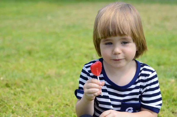 Portrait Cute Boy Heart Shaped Lollipop Concept Child Love Affection — Stockfoto