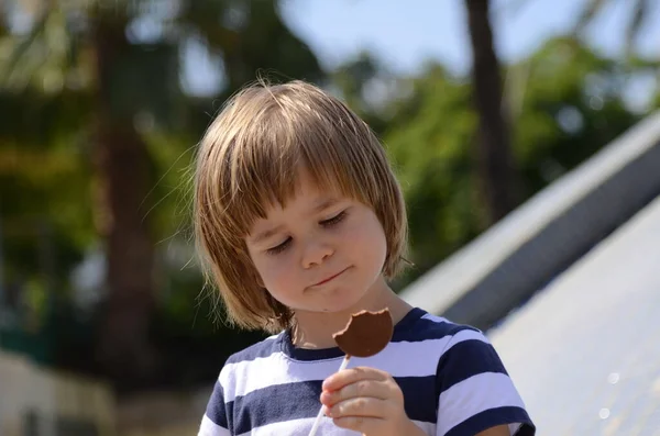 Little Boy Eats Chocolate Ice Cream Candy Stick Close Child — Foto de Stock