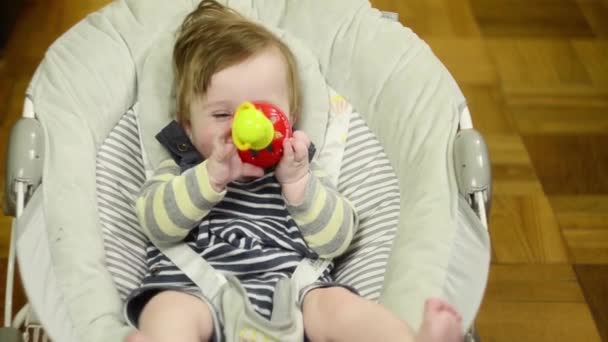 Positive Smiling Baby Boy Month Old Plaing Rattle Deck Video — Videoclip de stoc