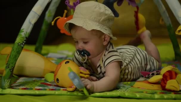 Month Old Baby European Wearing Safari Hat Jungle Play Mat — Stock video