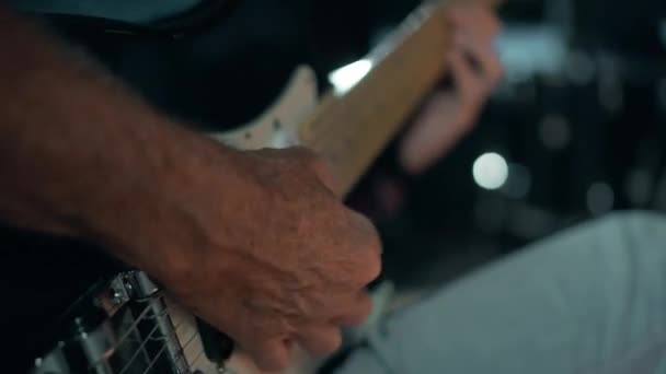 Old Man Plays Electric Guitar Close Hand Plucking Strings Rock — Stockvideo