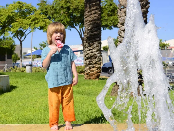 Cute Little Boy Playing Fountain Child Yellow Pants Rejoices Summer — Φωτογραφία Αρχείου