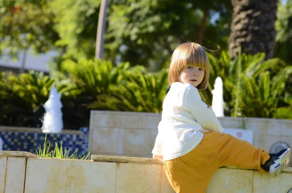 Cute Little Boy Playing Fountain Child Yellow Pants Rejoices Summer — Foto de Stock