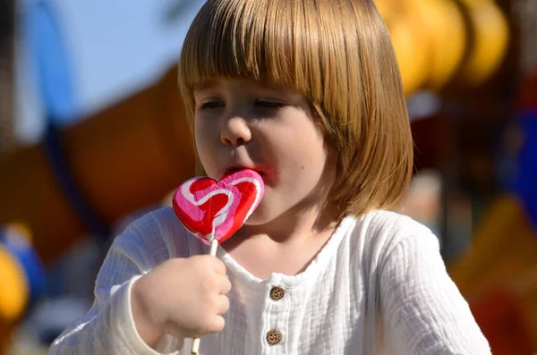 Portrait Cute Positive Little Boy Heart Shaped Candy Concept Mother — Stockfoto