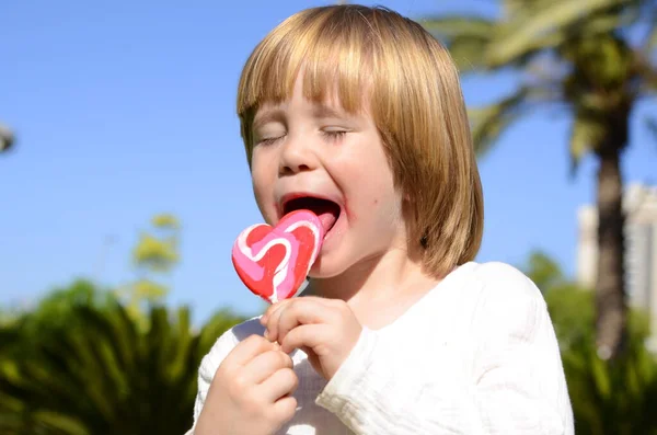 Portrait Cute Positive Little Boy Heart Shaped Candy Concept Mother — Foto de Stock