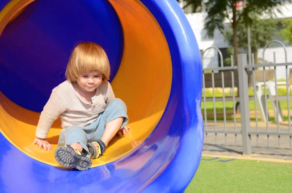 Little Boy Rides Slide Playground House Yard Modern Neighborhood Kid — Stock Photo, Image