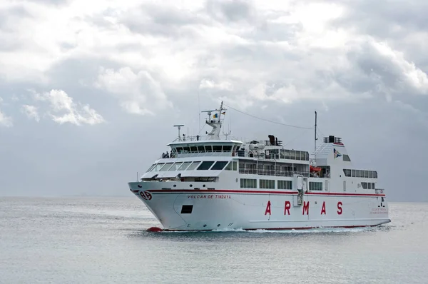 Blanca, Spain - December 13, 2014: The ferry Volcan de Tindaya ARMAS turning into harbour in Playa Blanca Lanzarote Canary Islands Spain. It connects Lanzarote with Fuerteventura