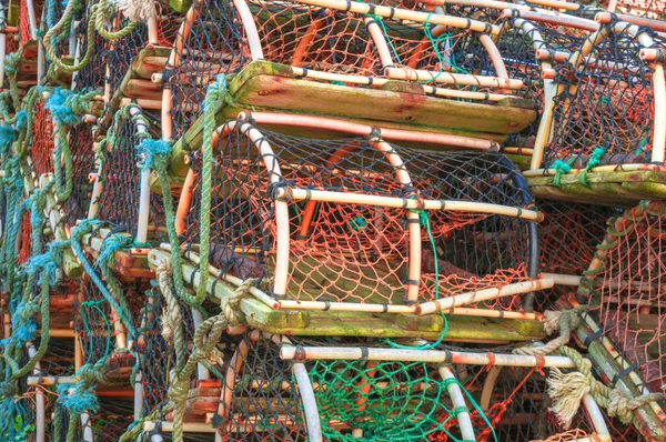 Stack of lobster crab pot's traps, seafood, fishing industry, healthy eating and lifestyle, sustainable oceans