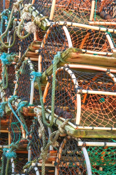 Stack of lobster crab pot's traps, seafood, fishing industry, healthy eating and lifestyle, sustainable oceans