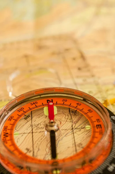 Compass Showing Direction Topographic Map Shallow Depth Field Focus North — Stockfoto