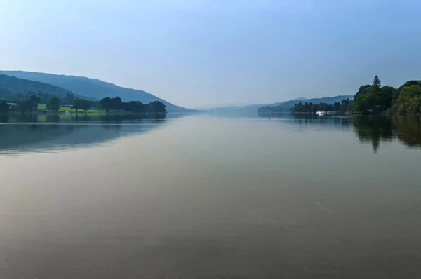 Coniston Water English Lake District Cumbria, flat calm with mist, national park