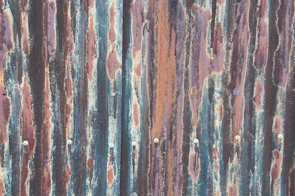 Rusty old, corrugated metal background for concept or design