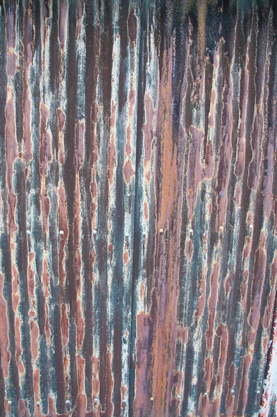 Rusty old, corrugated metal background for concept or design
