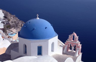 Beautiful blue domed church in Oia, island of Santorini, Greece