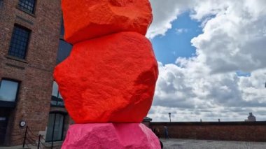 Modern sculpture on the exterior of Tate Liverpool art gallery in the Albert Dock Area in Liverpool, Merseyside on a beautiful spring day