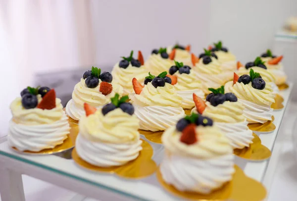 Table with cakes and desserts — Stock Photo, Image