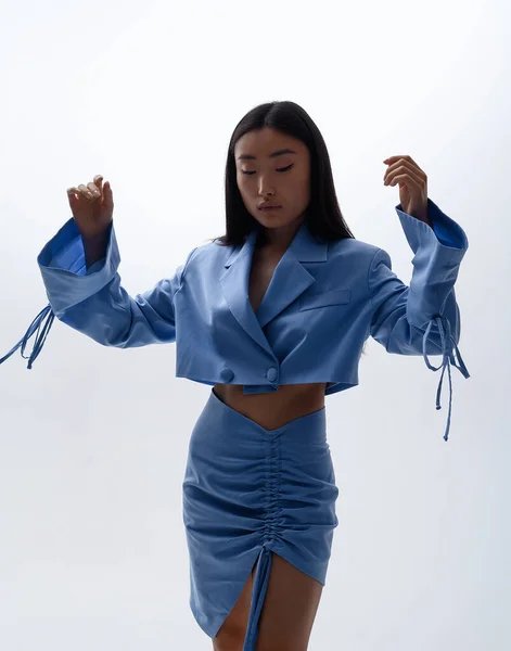 Beautiful Asian Girl Blue Suit Poses White Wall Photo Studio — Stok fotoğraf