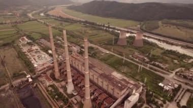 Aerial view of disaffected coal power plant, at sunset