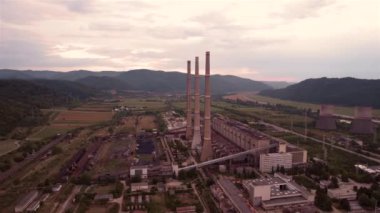 Aerial view of disaffected coal power plant, at sunset