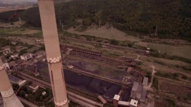 Aerial view of disaffected coal power plant, at sunset