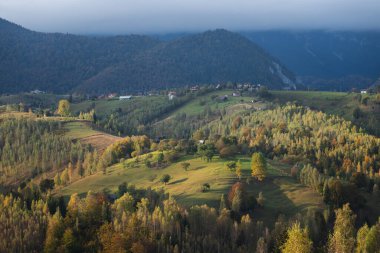Autumn in the Romanian village. Rural landscape in the Carpathian Mountains, Romania