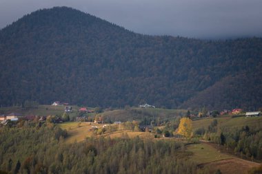 Autumn in the Romanian village. Rural landscape in the Carpathian Mountains, Romania