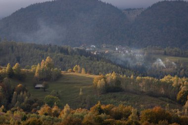 Autumn in the Romanian village. Rural landscape in the Carpathian Mountains, Romania
