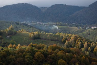 Autumn in the Romanian village. Rural landscape in the Carpathian Mountains, Romania