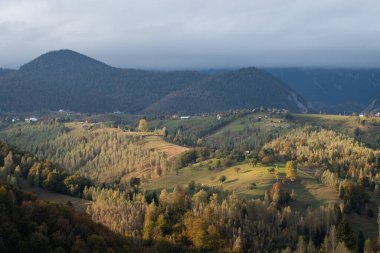 Autumn in the Romanian village. Rural landscape in the Carpathian Mountains, Romania