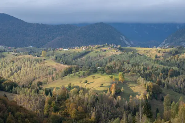 Autumn in the Romanian village. Rural landscape in the Carpathian Mountains, Romania