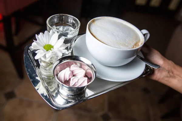 cup of coffee  and  flower