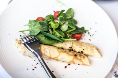 Dietary pancakes with cheese Avocado salad, tomato, spinach