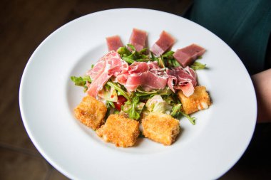 Salad with tuna, bacon and nuggets. High quality photo