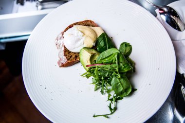 toast with egg, spinach and avocado