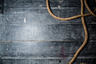 ahşap arkaplanda ip