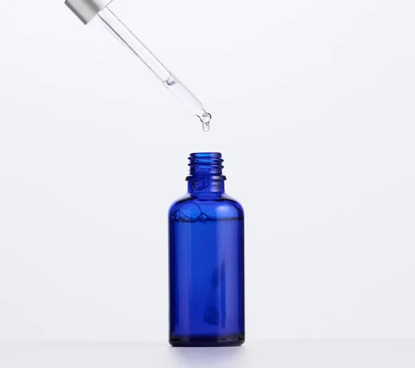 Blue Glass Bottle Pipette Cosmetics Oils Serum Advertising Product Promotion — Stock fotografie