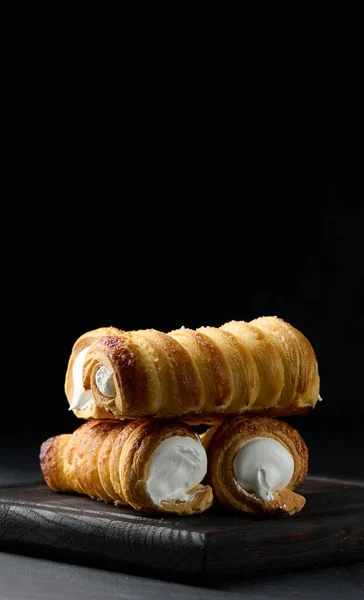 Baked Tubules Whipped Protein Cream Wooden Board Black Background — Stock Photo, Image