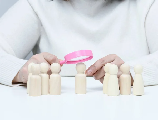 Woman Holding Magnifying Glass Wooden Men White Table Personnel Recruitment — Stockfoto