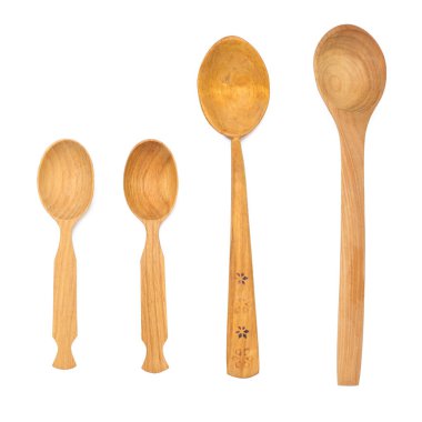 Empty wooden old vintage spoons with long handle isolated on white background, top view, set