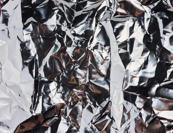 Crumpled gray foil sheet for food packaging, full frame