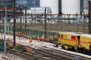 Paris, France - 17.04.2022: Workers repair the rails between Paris and Ivry-sur-Seine