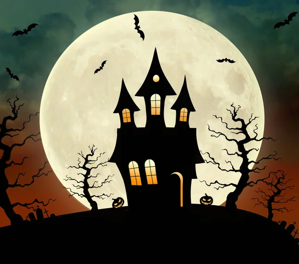 Halloween haunted house at full moon