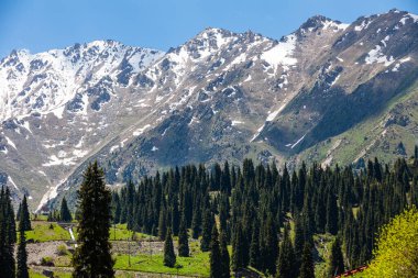 Road to the Big Almaty Lake. Hills in the Zailiyskiy Alatau Mountains, Tien Shan mountain system in Kazakhstan