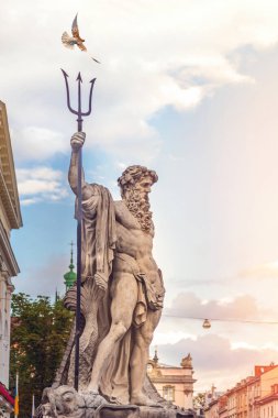 Lviv, Ukraine - August 18, 2021: Sculpture of Neptune on the Market square (Rynok square) in Lviv, Ukraine.