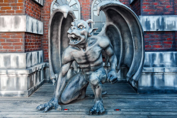 Odessa, Ukraine - August 17, 2021: Chimera or gargoyle in the park of Odessa, Ukraine.