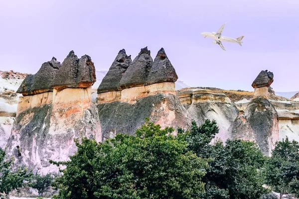 Airplane Flies Hill White Drone Hovering Bright Blue Sky Cappadocia — Stock Photo, Image